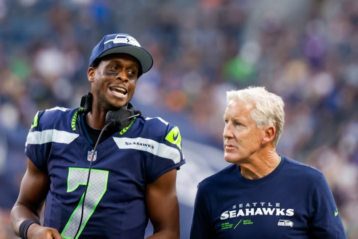 Geno Smith (left) and Pete Carroll
